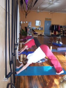 Down Dog in Yoga is good for lengthening hamstrings and opening shoulders when done correctly