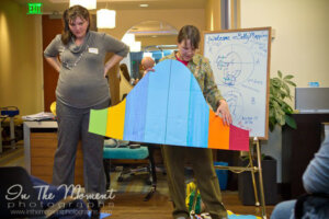 Gail holding Bell Curve