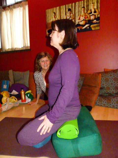  Liz Koch giving Gail a lesson in sitting on a bolster