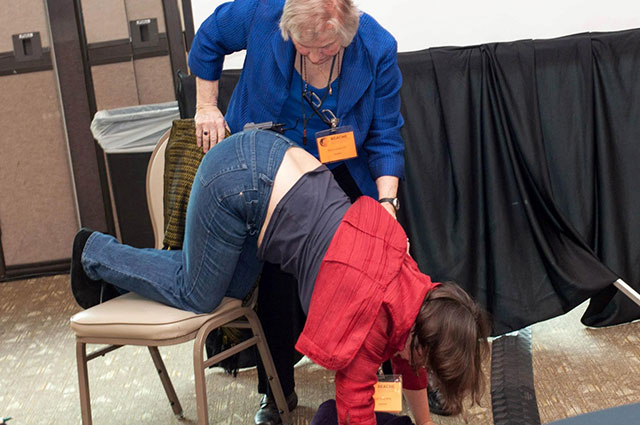 Gail shows Penny the Forward-leaning Inversion