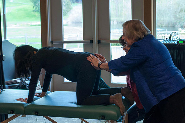 Penny teaching Gail the Lisa Cook maneuver